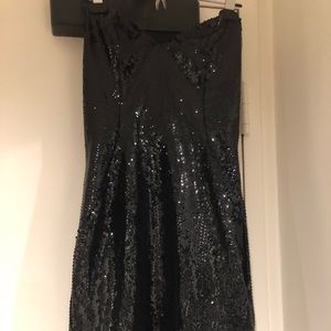 Sexy black sequin dress, tube top, tiny slit in the front and sexy back